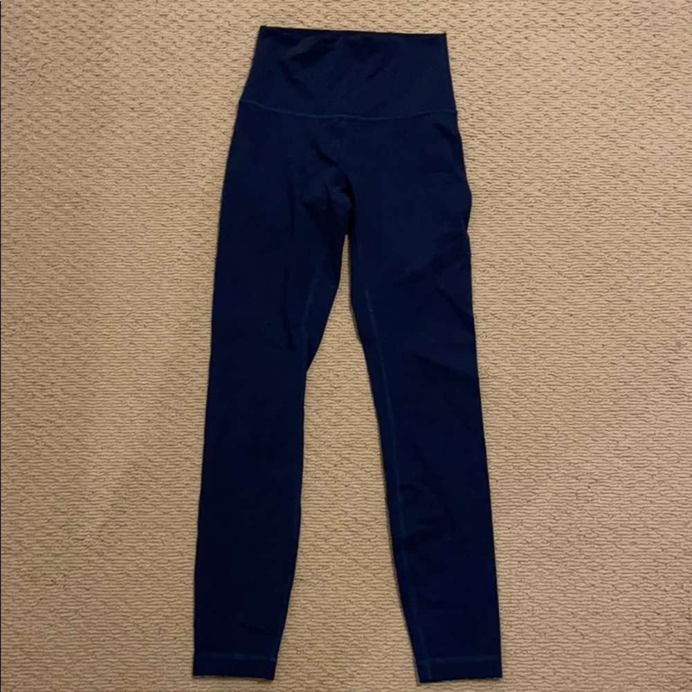 A navy pair of a lulu lemon leggings